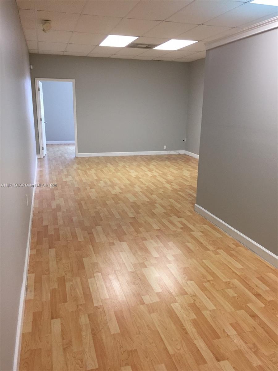 Office condo unit on 2nd floor with Central AC, private bathroom, and laminate floors. Freshly painted and ready to move in! Convenient location on main thoroughfare with quick access to the Turnpike. Common parking including some covered spaces.