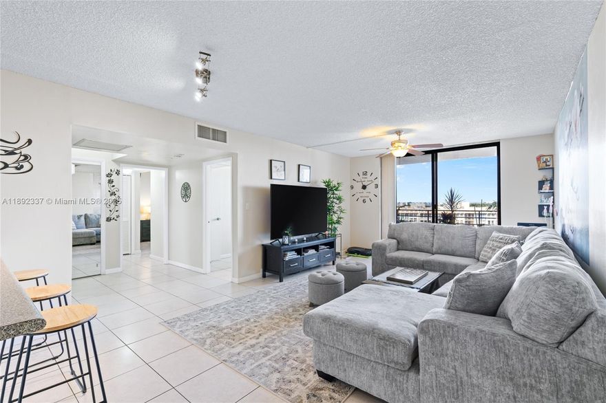 Elegant 2-bedroom, 2-bath residence with sweeping views of the Diplomat Waterway. The home features modern tile flooring throughout and an open-concept kitchen ideal for entertaining, complete with stainless-steel appliances and updated cabinetry. Both bedrooms offer excellent storage, including a walk-in closet. Well maintained and move-in ready. Located in the sought-after Olympus.Condominium, enjoy resort-style living just minutes from the beach, Aventura, premier shopping, and dining. Set on 18+ acres of lush grounds, the community boasts a multi-million-dollar clubhouse, a state-of-the-art fitness center with saunas, four tennis courts, and pickleball.