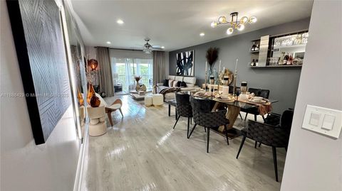 Photo of 300 SW 130th Ter #407B, Pembroke Pines, FL 33027 (MLS # A11886429)