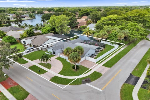 Photo of 1221 NW 78th Ave, Plantation, FL 33322 (MLS # A12061055)
