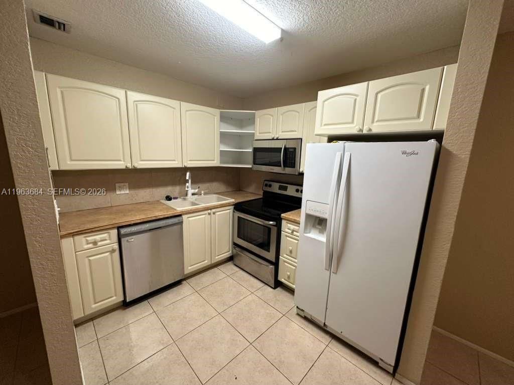 Photo of 6289 Lear Dr #404, Lake Worth, FL 33462 (MLS # A11963684)