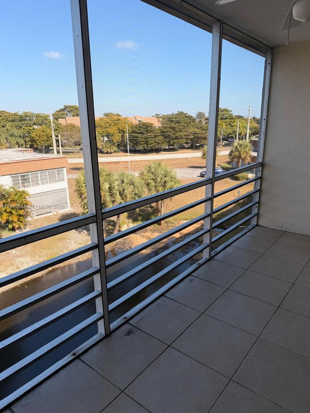 Photo of 6289 Lear Dr #404, Lake Worth, FL 33462 (MLS # A11963684)