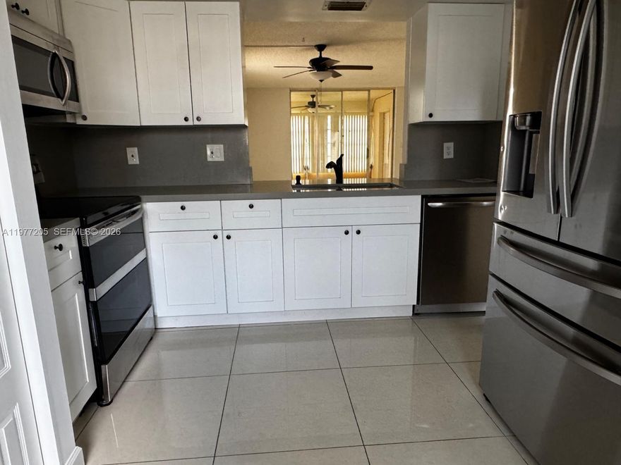 Spacious and bright 2-bedroom, 2-bath apartment ALL AGES WELCOME with an enclosed Florida room — perfect for a home office, guest space, or extra lounge area. The kitchen is remodeled, offering a fresh and modern feel. You'll enjoy the convenience of an in-unit laundry and a spacious dine-in kitchen. This apartment also includes an additional storage space located inside the Florida room, along with tile flooring throughout. Community requirements: No pets permitted. Minimum credit score of 620.