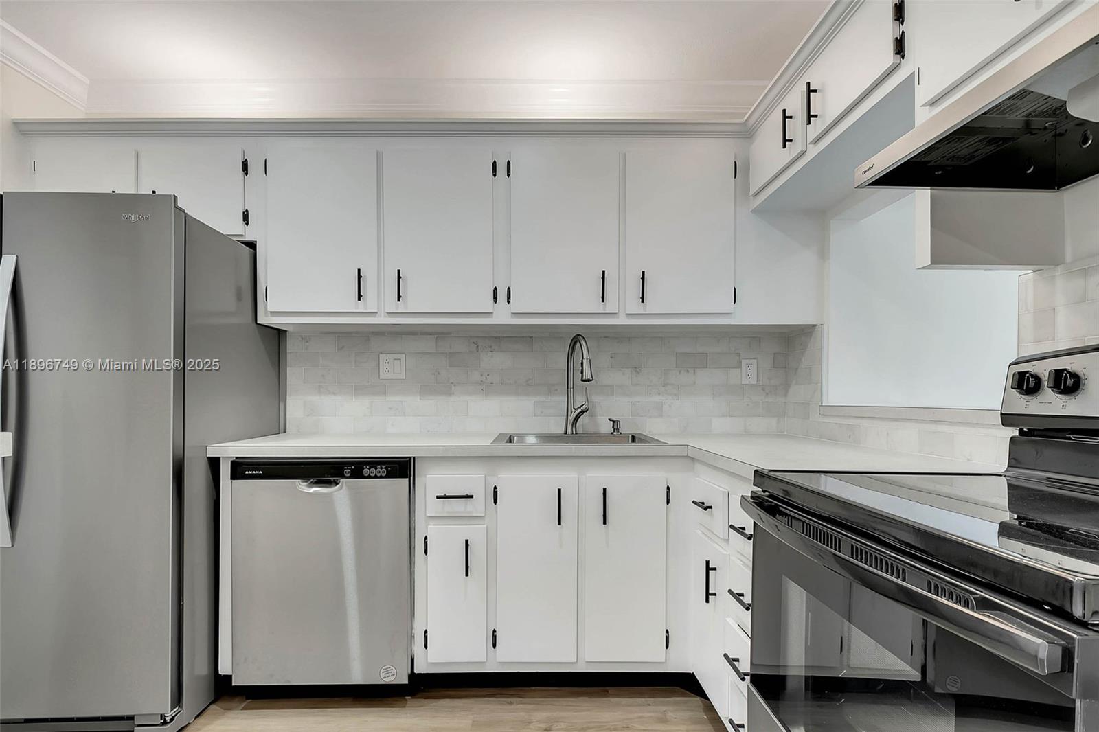 Beautifully renovated 1st floor condo in quaint building! Everything new! Impact sliding doors, vinyl floors throughout, new appliances, recessed lighting, new bathroom, new A/C. Great closet space. Patio area. Pool, gym, laundry facilities, parking and more. Near Dadeland, expressways, shopping and Baptist.