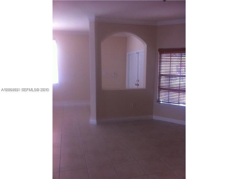 DORAL SOUTHEAST PATIO-HOM - Residential