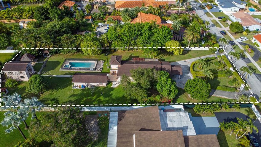 Rare opportunity in West Miami! This expansive property sits on an oversized 0.85-acre lot (±37,060 SF) just a few blocks from Belen Jesuit Preparatory School. Offering exceptional space, privacy, and versatility, this estate is ideal for end-users seeking a multigenerational layout, investors, or developers looking to capitalize on a unique parcel in a highly desirable location. The main residence features 4 bedrooms and 2 bathrooms, providing a comfortable and functional layout. In addition, the property includes two guest houses: • Guest House 1: 2 bedrooms, 1 bathroom — perfect for extended family or rental income. • Guest House 2: A two-story structure with 1 bedroom and 1 bathroom — an excellent option for an office, studio, or private suite. The massive lot allows room for further customization such as luxury outdoor living, pool, gardens, or additional structures (subject to county approval). A large driveway and carport offer abundant parking for multiple vehicles, RVs, or boats, all without HOA restrictions. Located minutes from major highways, shopping, dining, and top-rated schools, this property provides the rare combination of acreage, location, and multiple living quarters in the heart of Miami. Endless potential for multigenerational living, rental income, or redevelopment. A true one-of-a-kind opportunity.
