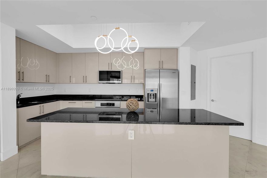 Beautifully updated 2BR/2.5BA corner unit at The Atrium at Aventura. Features a remodeled kitchen with new appliances, upgraded vanities, marble floors, and floor-to-ceiling windows with stunning water and pool views. Amenities include pool, spa, gym, sauna, kids’ area & concierge. 2 parking spaces and washer/dryer in unit. Prime location near Aventura Mall, Charter School & parks.