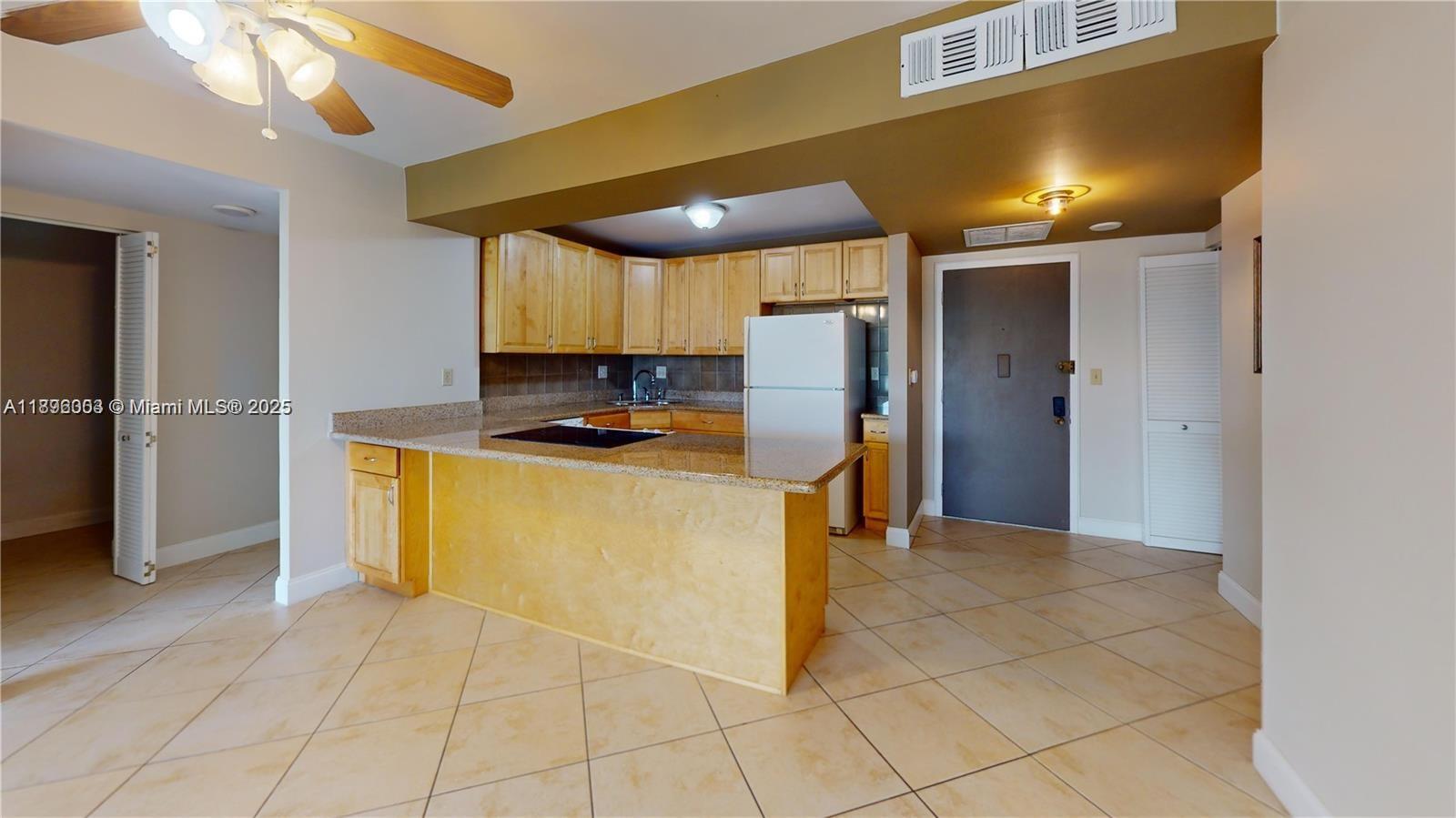 WELCOME TO THIS BEAUTIFUL, SPACIOUS AND UPDATED 2 BEDROOM AND 2 BATHOOMS CONDO IN HALLANDALE! THIS CONDO OFFERS COMFORT, COVENIENCE, AND STYLE! FEATURING AN OPEN-CONCEPT LIVING AREA, MODERN KITCHEN WITH GRANITE COUNTER AND PRIVATE BALCONY! BOTH BEDROOMS ARE GENEROUSLY SIZED WITH APLE CLOSET SPACE, AND A DEN THAT IT COULD BE USE AS AN OFFICE SPACE! LOCATED IN AN EXCELLENT MAINTED COMMUNITY WITH AMENTIES SUCH AS LARGE POOL FITNESS CENTER, SECURE PARKING AND CONCIERGE!
