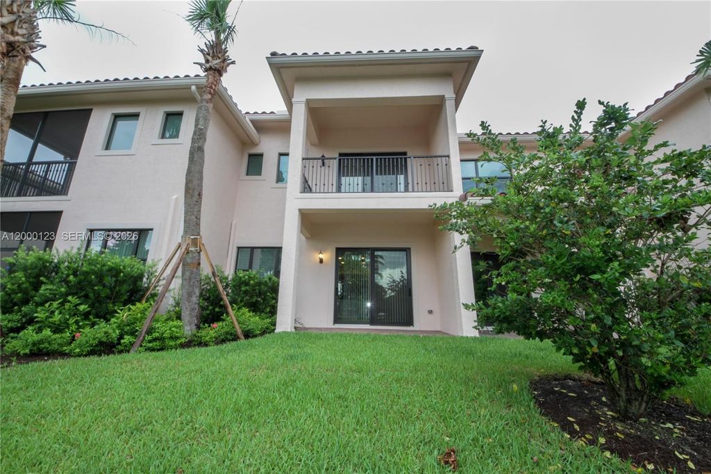 Photo of 106 SW 127th Terrace #106, Plantation, FL 33325 (MLS # A12000123)
