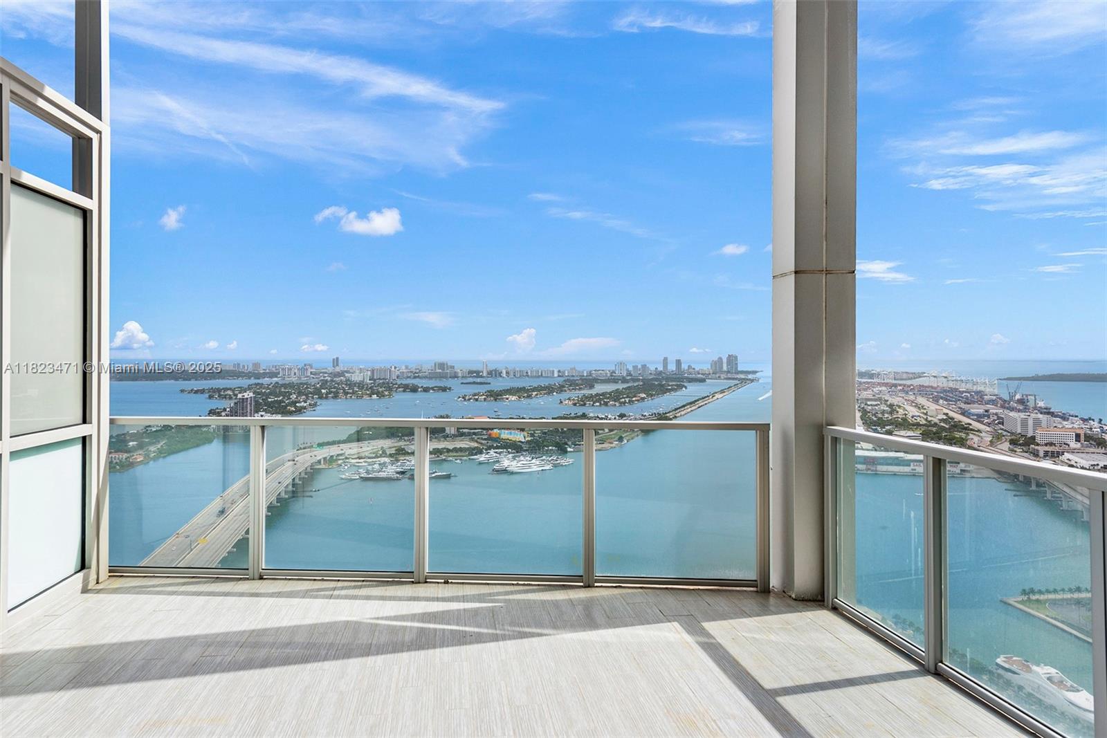 Modern 2-story 20' ceiling Loft-style 1 Bedroom + large Den with built-out closet, 2 full Bath partially remodled residence. Enjoy panoramic unobstructed views from Biscayne Bay beyond the island of Miami Beach and the open Atlantic Ocean, with incredible sunrises. The Primary Suite features a frameless glass enclosed shower showcasing all the views, dual vanity and spaciouse built in walk-in closet. Floor to ceiling, wall to wall framed glass overlooking downstairs Living room and all the panoramas.Viking appliances. Amenities include concierge, beach club at Bently Beach South of Fifth, 24/7 security, valet, west pool and east sunrise lap pool, fitness center with new equipment, spa, pooolside Champaign bar, adult & kids game rooms and more! Walking distance to Kaseya Center Arena.
