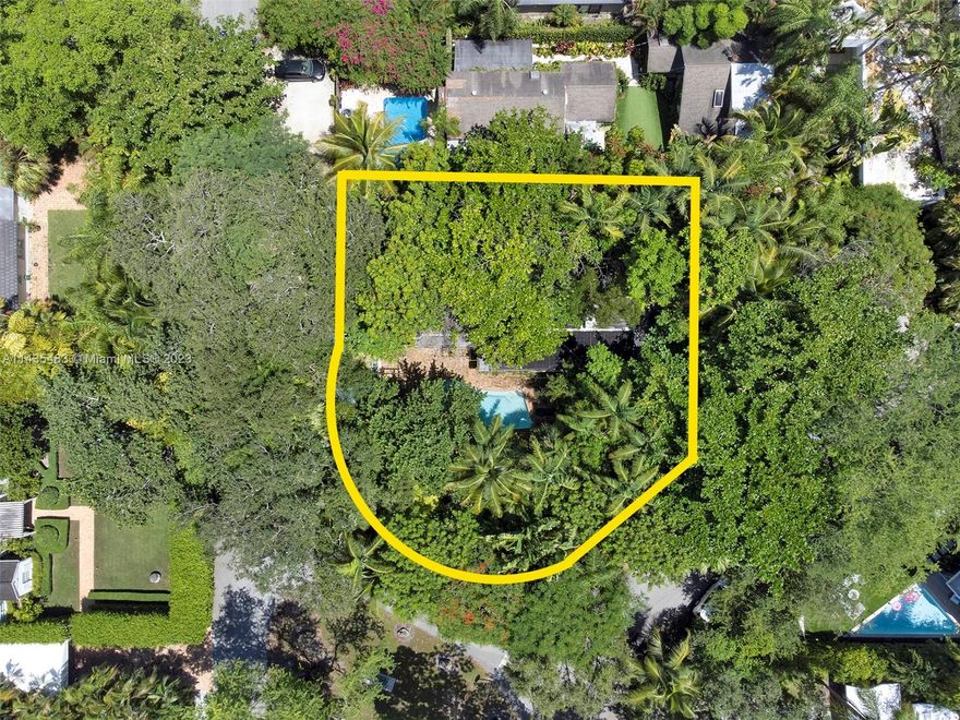 Discover your next chapter on this stunning 10,000 sqft lot, primed and waiting for your dream home vision to come to life. Situated on a tranquil street, with the hushed hum of minimal traffic, there stands a charming existing home with a refreshing pool. Whether you choose to reside or rent while orchestrating the blueprint of your ultimate oasis, the potential is boundless. As part of the coveted Utopia Homeowner’s Association, this quintessential South Grove gem boasts a verdant, tropical setting, offering the utmost privacy. Positioned across from a quaint neighborhood park, it's enveloped by multimillion-dollar marvels, ensuring your investment thrives in a sought-after locale. Secure your future in this unparalleled setting.