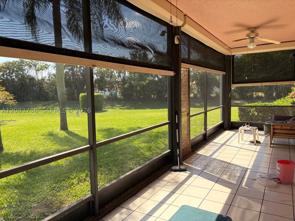Photo of 7860 Lexington Club Blvd #B, Delray Beach, FL 33446 (MLS # A12093756)