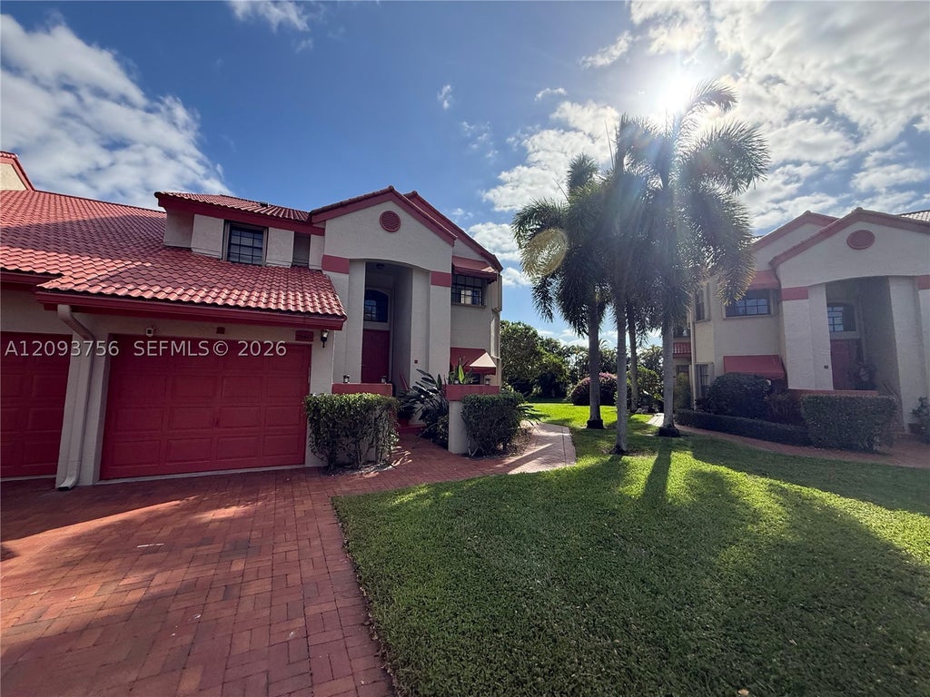 Photo of 7860 Lexington Club Blvd #B, Delray Beach, FL 33446 (MLS # A12093756)