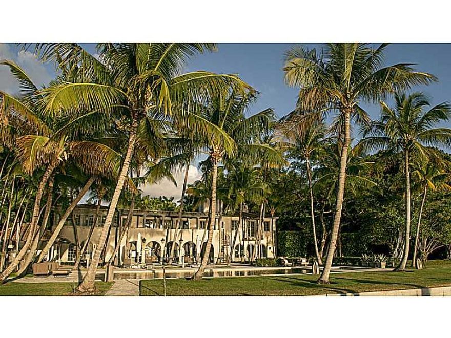 The ultimate European Contemporary Estate w/200 ft on wide Bayfront w/Miami Skyline views & glorious Sunsets! Sited on over 52,000 sf of exquisite gardens & swaying palm trees, this sophisticated estate was transformed w/impeccable style. Details abound w /2 story rotunda foyer, open living & dining rms open to bay & courtyard w/koi pond, wine cellar, media rm, master suite w/massive closets, gym, summer kitchen, dock/lift, large pool/spa & total privacy for the most discriminating buyer. The best!