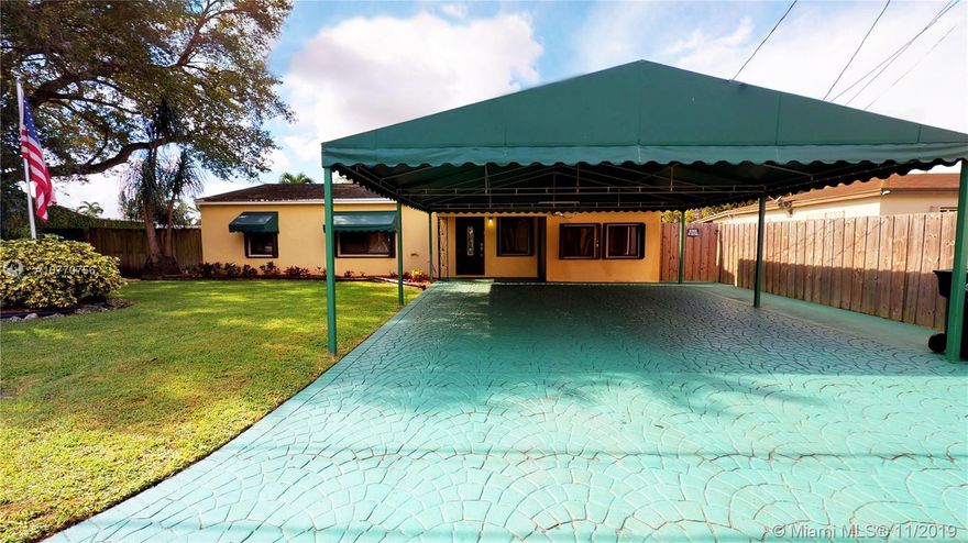 Perfectly located ranch style, single family home with a view! Bring your toys to the lake and enjoy this 3bed/2bath home with a bonus room. Well maintained and lots of storage inside and out, as well as a great workshop/shed. Plenty of room for entertaining, wired for surround sound system throughout. Have a cocktail with your guests by the water! Fully fenced in yard and accordian shutters on all windows with new awnings. The home is located across AD Barnes Park, next to train tracks. Minutes from Tropical Park, restaurants, shopping, and the Palmetto Expressway!