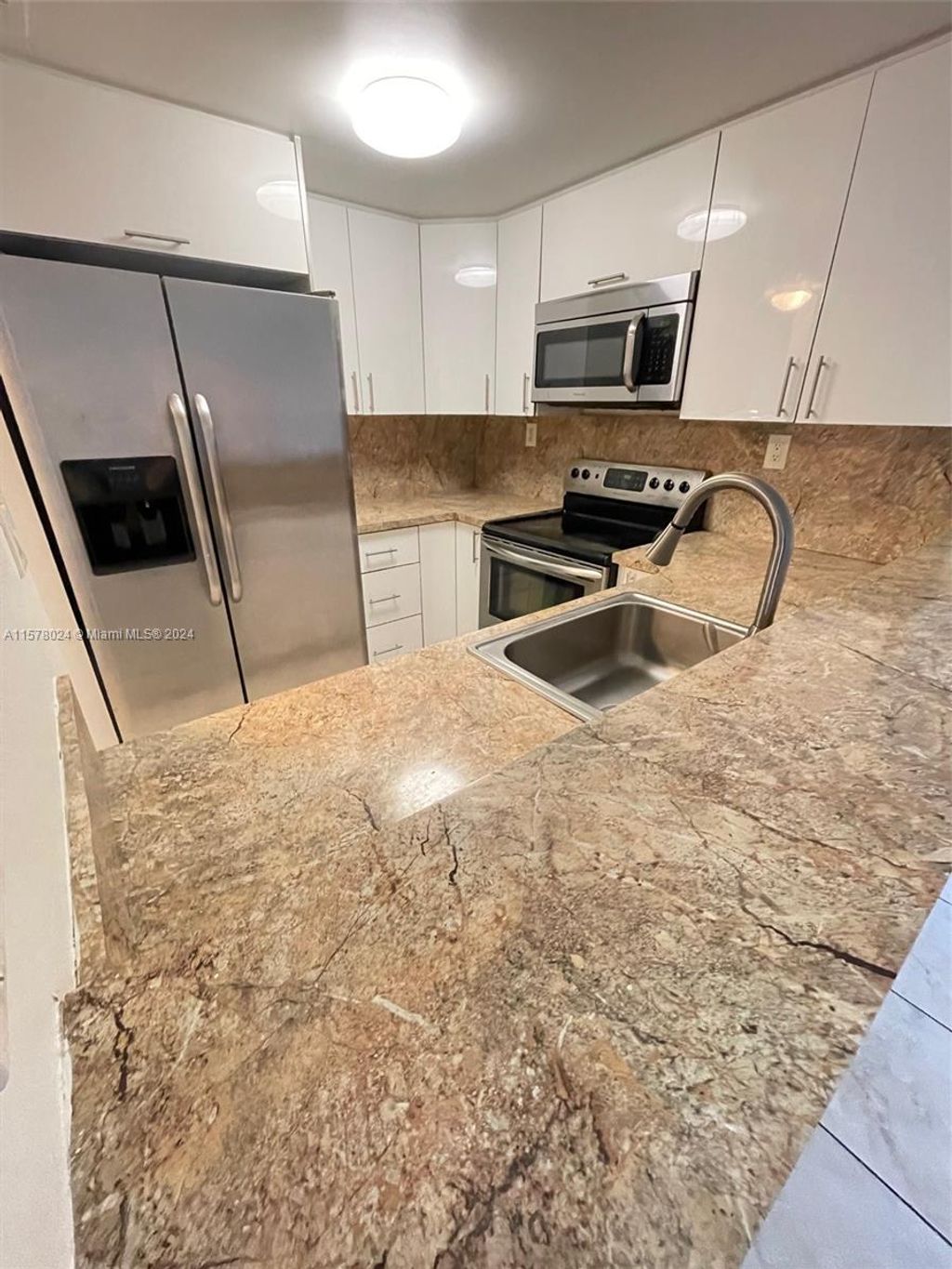 Photo of 5805 Washington St #13, Hollywood, FL 33023 (MLS # A11578024)