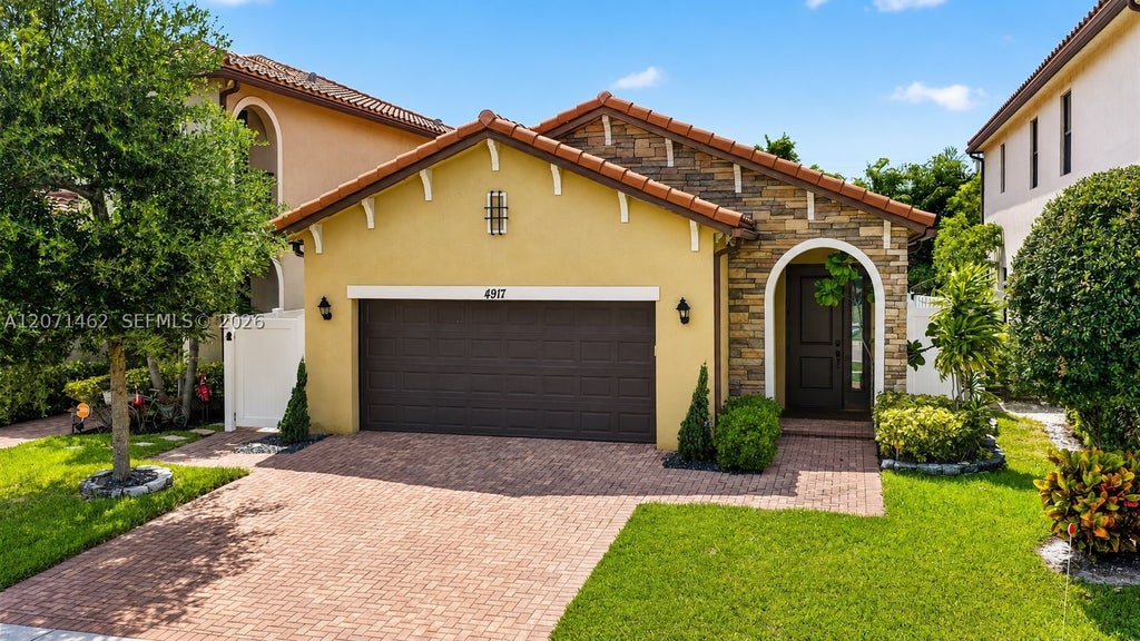 Photo of 4917 NW 51st Ter, Tamarac, FL 33319 (MLS # A12071462)
