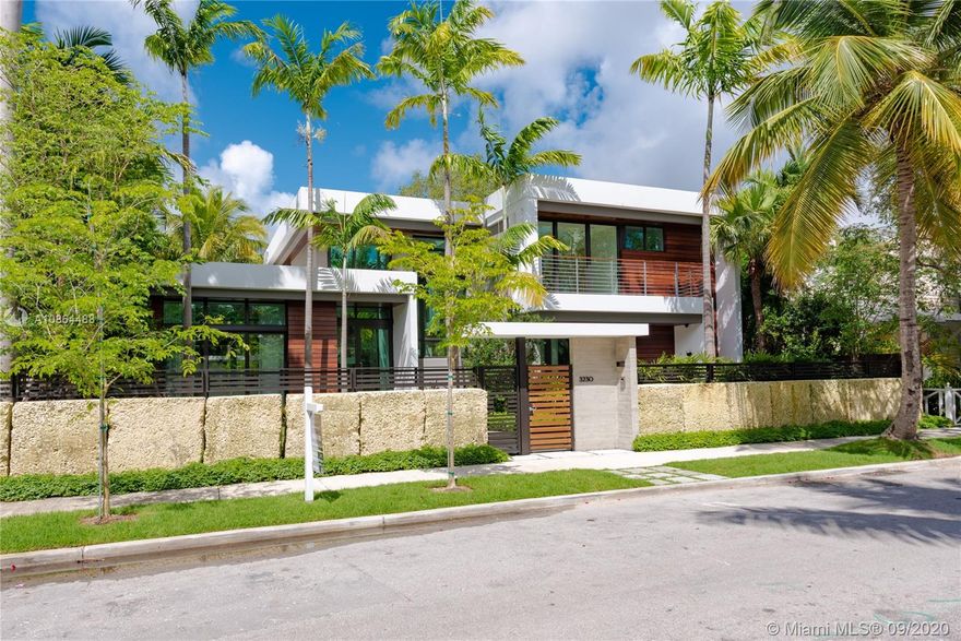 Enjoy the Coconut Grove lifestyle in this new, spectacular home by architect Charles Treister. Built on the ridge at 21 ft above sea level & set w/in a private, lush garden. The home’s high ceilings & glass walls seamlessly integrate the outdoor spaces – pool, spa, & covered patio, kitchen & dining areas – so you can relax in a tropical paradise. The Green home includes a separate apartment w/own entrance for in-laws, office or guests; 2-car garage; elevator; basement; whole house generator; home automation; pantry; & master bedroom suite w/private terrace, spa bath, dressing area & 2 walk-in closets. The quality finishes, fixtures & attention to detail are unsurpassed. Fenced & gated, turnkey ready. Located in the desirable North Grove, close to downtown, airport & Miami's best schools.