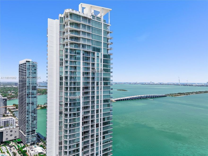 Extremely motivated owner. Experience elevated living at Biscayne Beach in this modern 2-bedroom, 2-bathroom corner residence — with the flexibility to convert the den into a second bedroom. Floor-to-ceiling windows flood the home with natural light and capture stunning bay views, creating a serene and sophisticated ambiance. Step off your private elevator into an exclusive foyer that opens to a bright, open-concept layout. The chef’s kitchen features premium Miele appliances, sleek wood cabinetry, and opens to a private glass-railed balcony ideal for enjoying the waterfront. The primary suite offers a custom walk-in closet and a spa-like bath with a soaking tub and glass-enclosed shower. Residents enjoy resort-style amenities. Two assigned parking spaces. A must see!