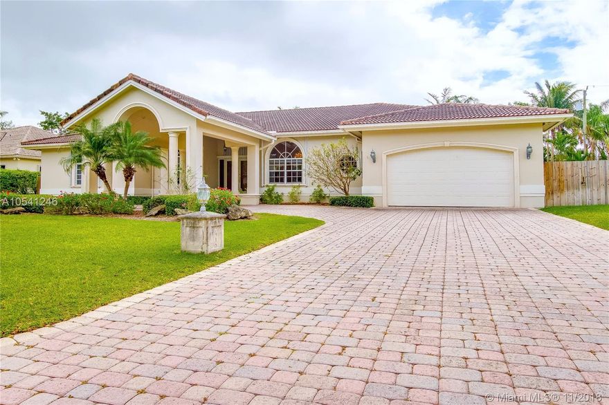 Reduced for a quick sale. Masterfully designed and custom built by legendary home builder Hollub Homes, the 4Bed/2.5Bath residence is located in the privately gated community of Lychee Nut Estates. The home is built with quality materials, luxurious finishes and unparalleled craftsmanship that is standard to Hollub Homes. Home features a modern and functional floor plan with high Volume & tray ceilings, crown moldings, french doors, separate laundry & storage room & much more. Gourmet granite kitchen with beautiful built-ins. Tons of natural light and storage throughout the home. Ready for your designer touches. The exterior features lush landscaping, a circular driveway, two car porte-cochere, and plenty of room for a pool. Walking distance to Coral Reef Park top-rated schools.