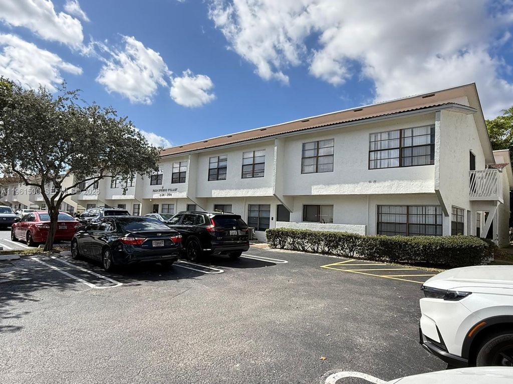 Photo of 2566 coral springs Dr, Coral Springs, FL 33076 (MLS # A11961500)