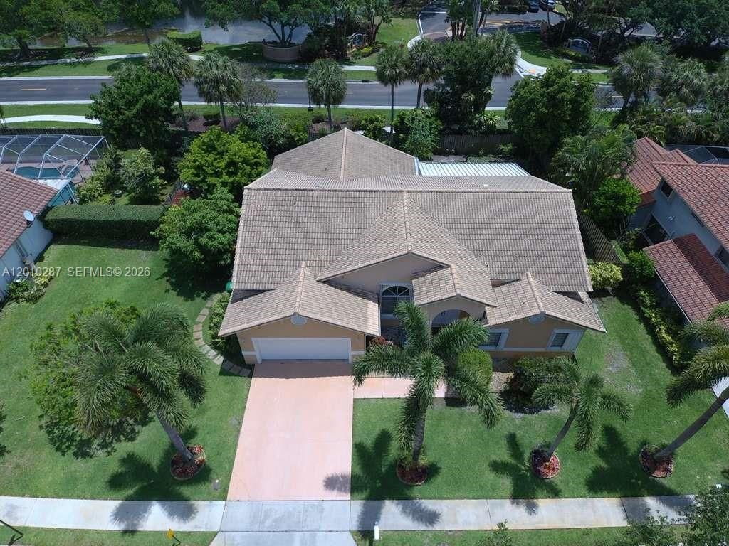 Photo of 1231 SW 102nd Ave, Pembroke Pines, FL 33025 (MLS # A12010287)