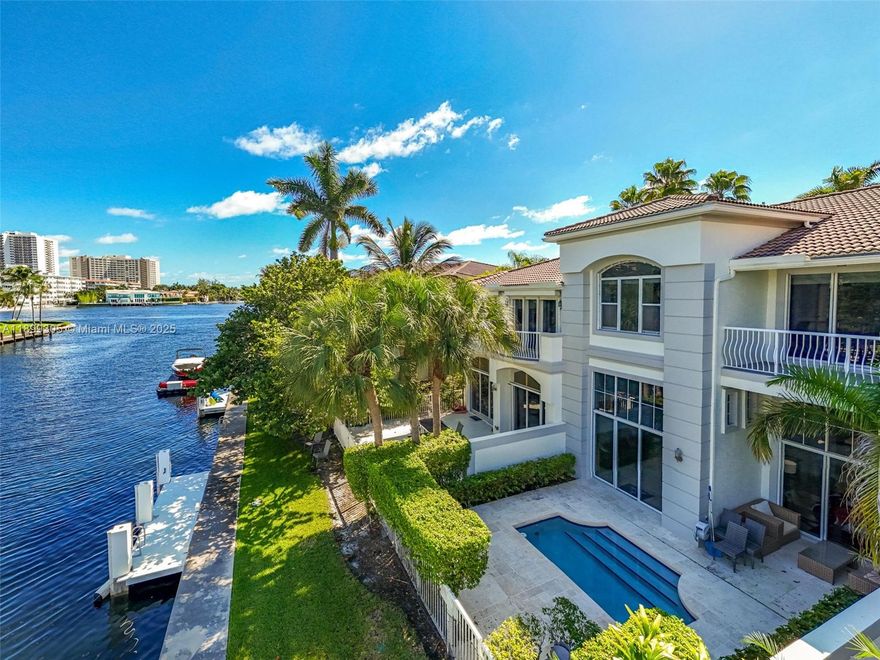 Discover the best value townhome at The Point, one of Aventura’s most sought-after gated communities. This 3,200 SF two-story residence showcases soaring 20-ft ceilings features 3 spacious bedrooms, 4.5 baths, and a private two-car garage—all complemented by stunning waterfront views.  Offering a pristine, well-kept interior, it’s the perfect opportunity to customize and design your ideal waterfront home. Set within 36 acres of lush landscaped grounds, The Point provides a world-class lifestyle with a luxury spa and fitness center, multiple pools, tennis courts, and a picturesque Intracoastal promenade. Enjoy the privacy of a home paired with the amenities and security of a premier resort community.