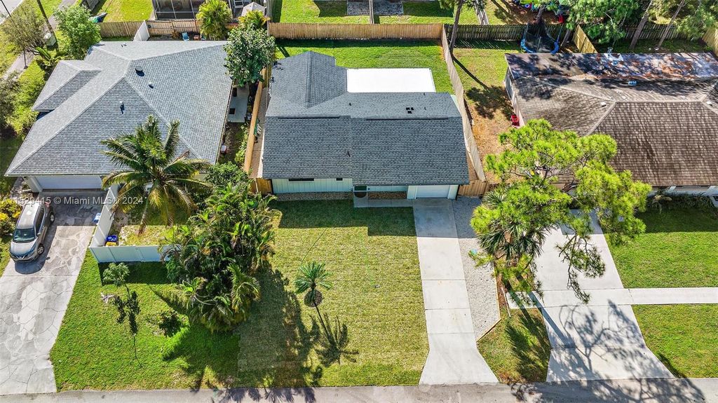 Photo of 6028 Roger St, Jupiter, FL 33458 (MLS # A11529415)