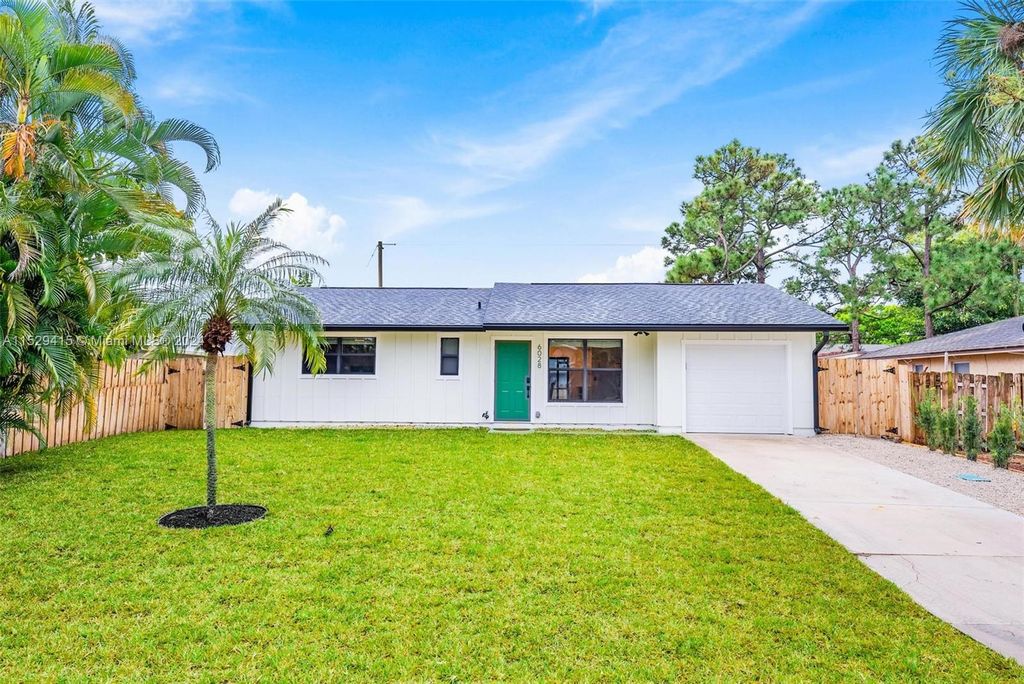 Photo of 6028 Roger St, Jupiter, FL 33458 (MLS # A11529415)