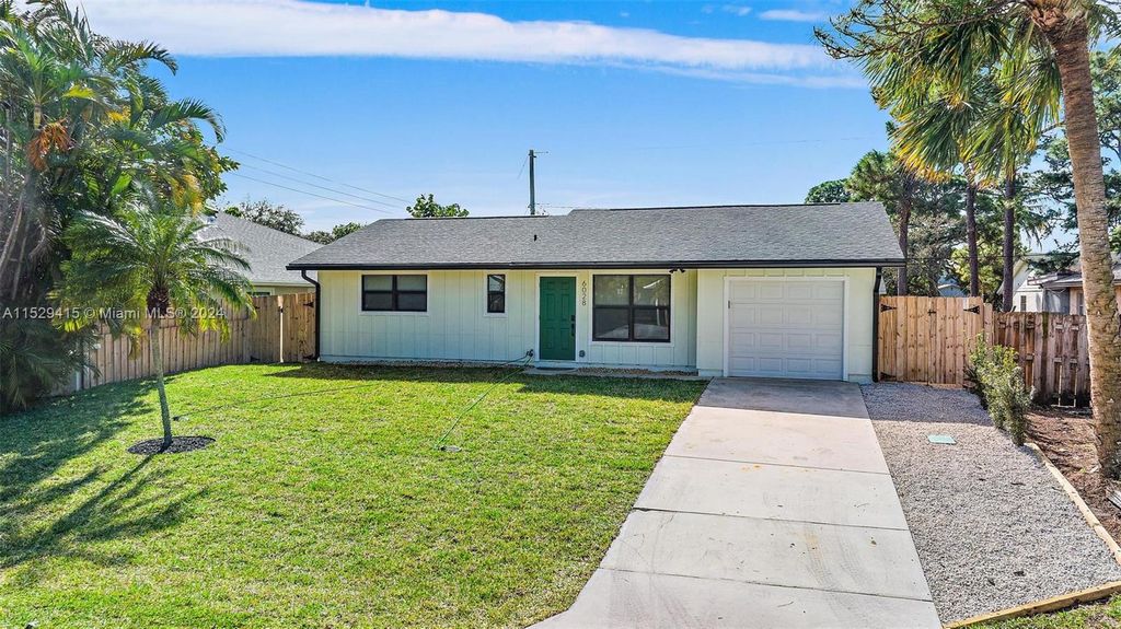 Photo of 6028 Roger St, Jupiter, FL 33458 (MLS # A11529415)