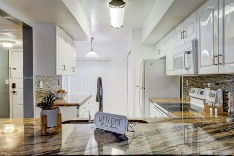 Photo of 7902 NW 7th Ct #7902, Plantation, FL 33324 (MLS # A11526172)