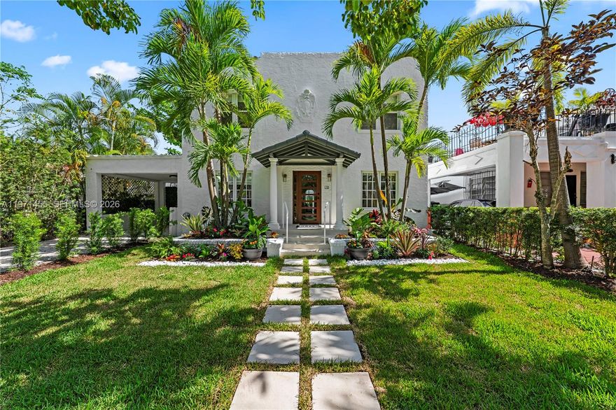In the heart of Buena Vista, this fully remodeled two-story residence seamlessly blends timeless 1920s charm with sophisticated modern living. The main house boasts four spacious bedrooms and three and a half bathrooms, thoughtfully redesigned with high-end finishes throughout. White oak hardwood floors flow seamlessly across the home, complemented by custom Taj Mahal stone vanities in each bathroom. The renovated kitchen features premium stainless steel appliances and opens to expansive living areas, anchored by a charming fireplace that creates a warm yet refined atmosphere. New hurricane-impact windows and doors flood the home with abundant natural light, enhance energy efficiency, and provide peace of mind. A detached ADU, perfect for guests, rental income, or a private office, offers a studio layout, kitchenette, and full bathroom. Situated on one of Buena Vista’s most desirable tree-lined streets, the home also features a rare enclosed front porch and a private backyard oasis with a brand-new pool currently being installed. Additional features include generous parking, a garage, and a dedicated laundry room. This move-in-ready opportunity is located in one of Miami’s most vibrant and centrally located neighborhoods, just minutes from the Miami Design District’s shops, galleries, and dining.