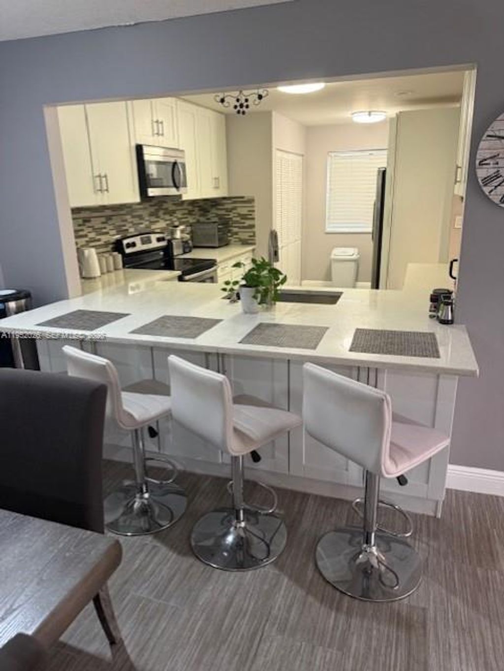 Photo of 330 Lakeside Ct #206, Sunrise, FL 33326 (MLS # A11952026)