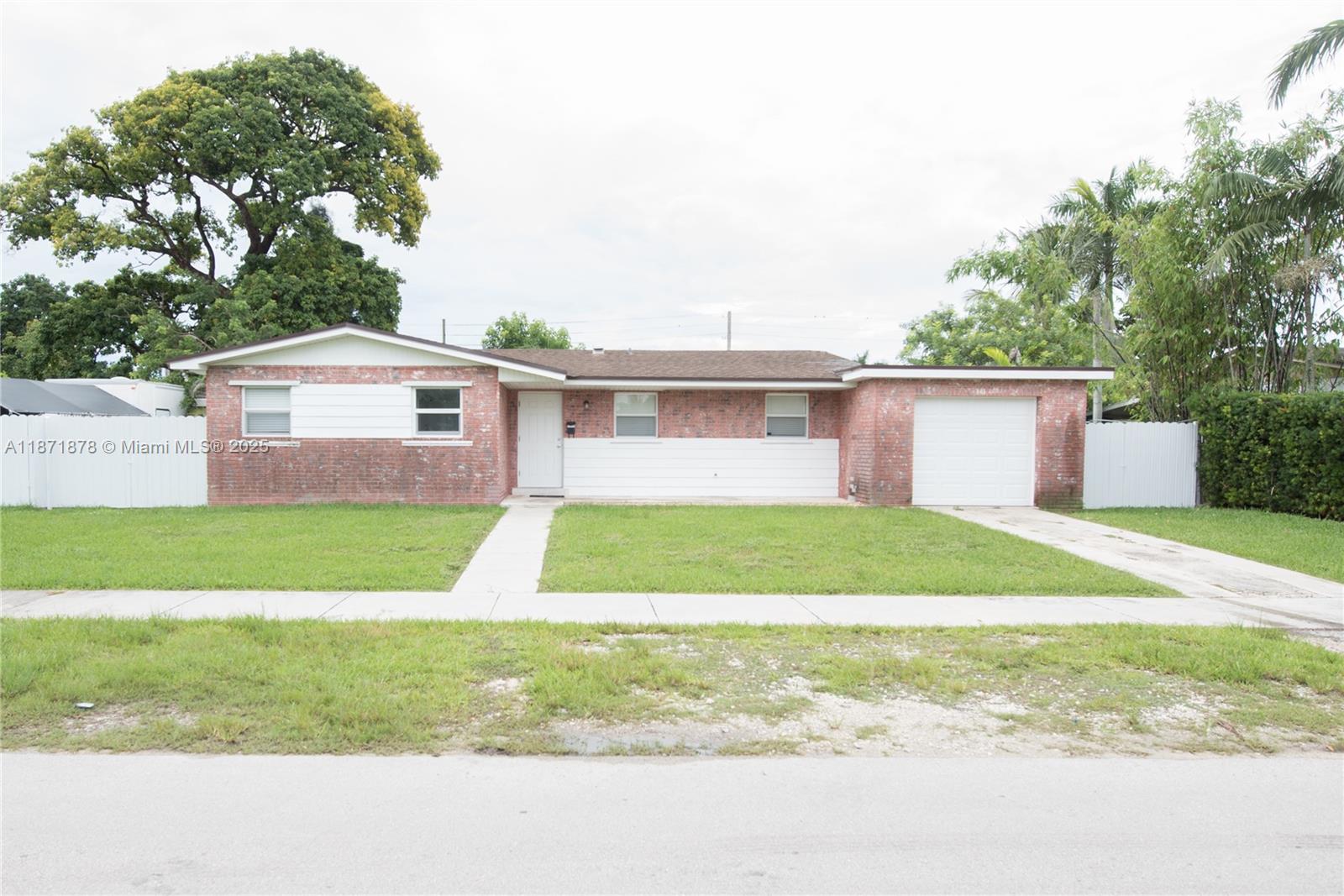 Charming 3BR/2BA home in sought-after Avocado Manor! Features a new shingle roof (2025), new A/C (June 2025), impact windows + hurricane panels. Enjoy a bright foyer, tile floors, blinds, and spacious living/dining areas with sliding doors to a screened patio. Kitchen offers refrigerator, stove, pantry. Fenced backyard with wood shed. Bedrooms have closets, shades; master includes walk-in closet and private bath with shower. Hallway has 2 linen closets. Tub/shower combo in guest bath. Washer/dryer hookup in 1-car garage with new door + water softener. PROOF OF FUNDS AND/OR PRE-APPROVAL LETTER REQUIRED PRIOR TO SCHEDULING A SHOWING OF THE PROPERTY!