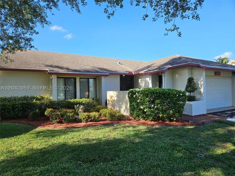 Photo of 10301 Greenbriar Ct, Boca Raton, FL 33498 (MLS # A12042057)