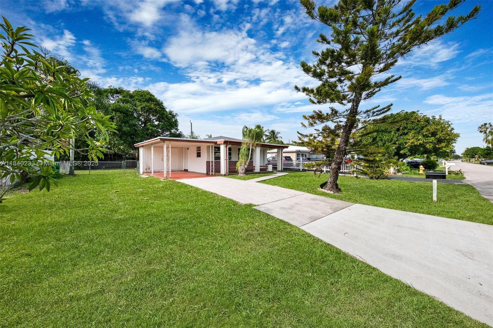Charming ranch-style home in good condition offering a 2/1 layout, a carport, and a well-kept backyard. The property presents a great opportunity for buyers to customize to their preferences while enjoying a solid foundation. Ideal for those seeking comfort, potential, and outdoor space. Move-in ready with room to make it your own.