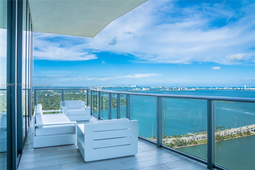 Fully furnished, corner penthouse in One Paraiso by Piero Lissoni, steps from Miami Design District or Wynwood and a bridge away from Miami Beach. Unobstructed Bay and Ocean views from this 49th floor masterpiece will take your breath away. Oversized sunrise and sunset terraces give you both privacy and space to relax. This penthouse is offered turn key with everything you need for an immediate move-in (unfurnished is optional). One Paraiso offers luxury amenities: waterfront spa and gym as well as a library, cinema, 3 swimming pools, jacuzzis, tennis courts, lounges, play rooms & more.