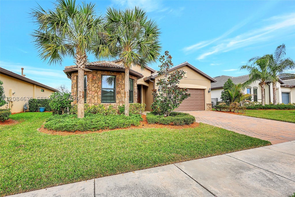 Photo of 727 SE Boboli Way, Port St Lucie, FL 34984 (MLS # A12084630)