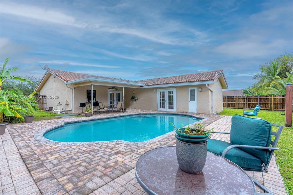Photo of 2357 NW 92nd Ave, Coral Springs, FL 33065 (MLS # A11825049)