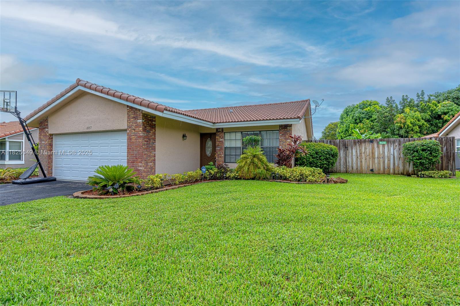 An exceptional home is available for purchase in the Coral Springs University subdivision. This property features 4 bedrooms, 2 bathrooms, and an updated kitchen equipped with stainless steel appliances and countertops. The expansive yard includes a pool, making it ideal family enjoyment and entertaining. With a well-designed layout and a generous BIG LOT-YARD with fruit tress & a 10,625-foot yard. This home is situated on one of the largest property lots in the neighborhood. Home is ready for a new family, and financing options are available. NO HOA, No restrictions. Ready to move in.