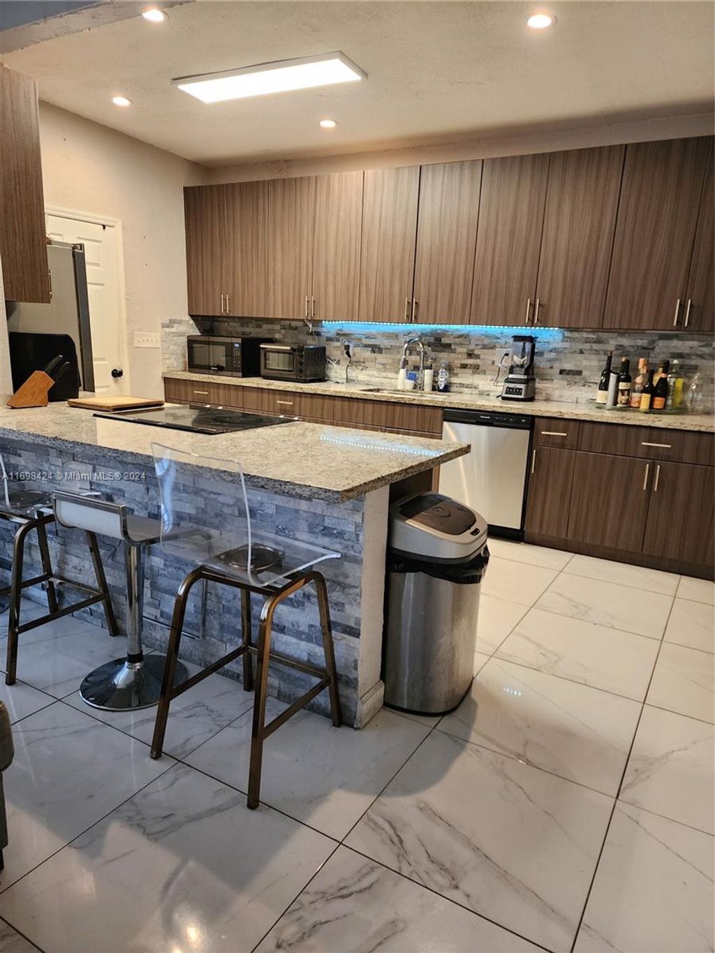 Photo of 486 W Evanston Cir #B, Fort Lauderdale, FL 33312 (MLS # A11698424)