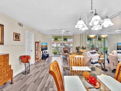 Photo of 9420 S Hollybrook Lake Dr #302, Pembroke Pines, FL 33025 (MLS # A11948433)