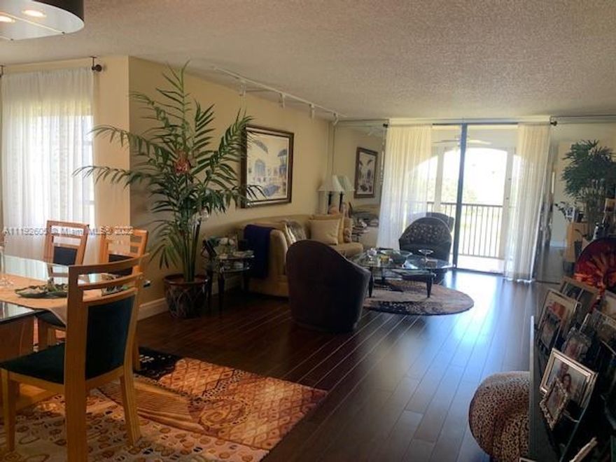 LARGE BRIGHT DOUBLE BALCONY CORNER UNIT CONDO COMES ON MARKET FOR FIRST TIME! PERFECTLY UPDATED THIS 2/2 FEATURES AN OVERSIZED MASTER SUITE WITH DRESSING AREA, LARGE GUESTROOM WITH HUGE CLOSET, LIVING ROOM, DINING ROOM, BREAKFAST ROOM, MODERN KITCHEN WITH APPLIANCES, SEPARATE LAUNDRY AREA WITH WASHER/DRYER ON THE ENCLOSED BALCONY. CONDO OVERLOOKS THE FORMER INVERARRY WEST GOLF COURSE. 1 ASSIGNED PARKING SPOT. THIS CONDO IS LOCATED IN A SECURE SINGLE BLDG  WITH PRIVATE HEATED POOL IN A 55+COMMUNITY. MAINTENANCE INCLUDES CABLE, WATER, RESERVE FUND.   CULTURAL CENTER OFFERS LIVE ENTERTAINMENT, POOLS, SPA, FITNESS CENTER. CONDO REQUIRES MINIMUM CREDIT SCORE 700. 40K ANNUAL INCOME PER INDIVIDUAL OR 60K PER COUPLE AND 6 MONTHS MAINTENANCE IN ESCROW REFUNDABLE AFTER 1 YEAR.