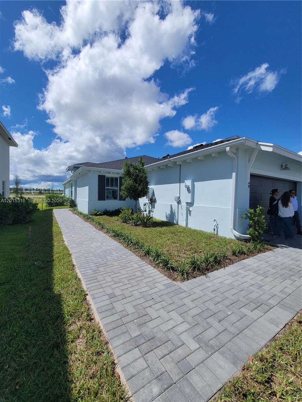 Photo of 1689 Whistlegrass Ln #1689, Loxahatchee, FL 33470 (MLS # A12015316)