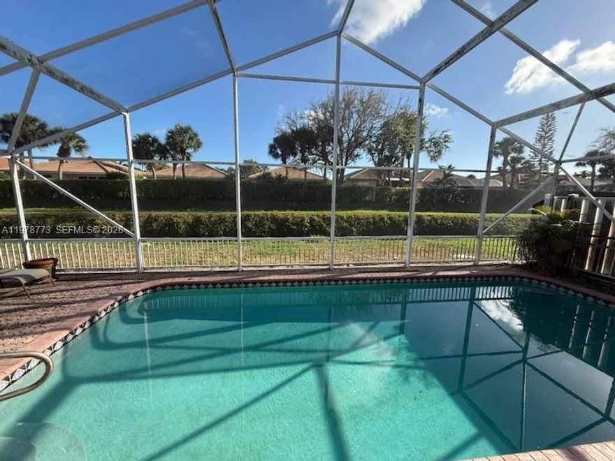 Welcome to 5244 Bodega Place inside the Gated All Ages Bel-Aire Community w/ low HOA Fee. Enjoy the Clubhouse, Pool, Tennis, gym & more. This 3 bedroom, 2 bath, 2035 sq ft single story residence has vaulted ceilings and screened pavered pool area overlooking the water. Roof 2011, New AC 2022, Water Heater 2016, New Appliances 2022. Neutral Tile in main areas. Rest of home is original condition and ready for your buyers to modernize. Bel-Aire is a prime location on the border of Boca and Delray Beach, zoned for Boca middle & high schools, A+ Morikami Elementary School. Close to the Beach, shopping & restaurants of Mizner Park and Atlantic Avenue / Downtown Delray. Owners can rent after owning for 1 year. Pets okay. Conventional/FHA/VA Financing available.