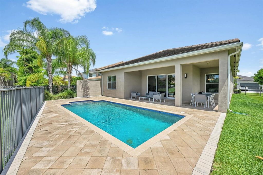 Photo of 9706 Celtic Sea Ln, Delray Beach, FL 33446 (MLS # A11805737)