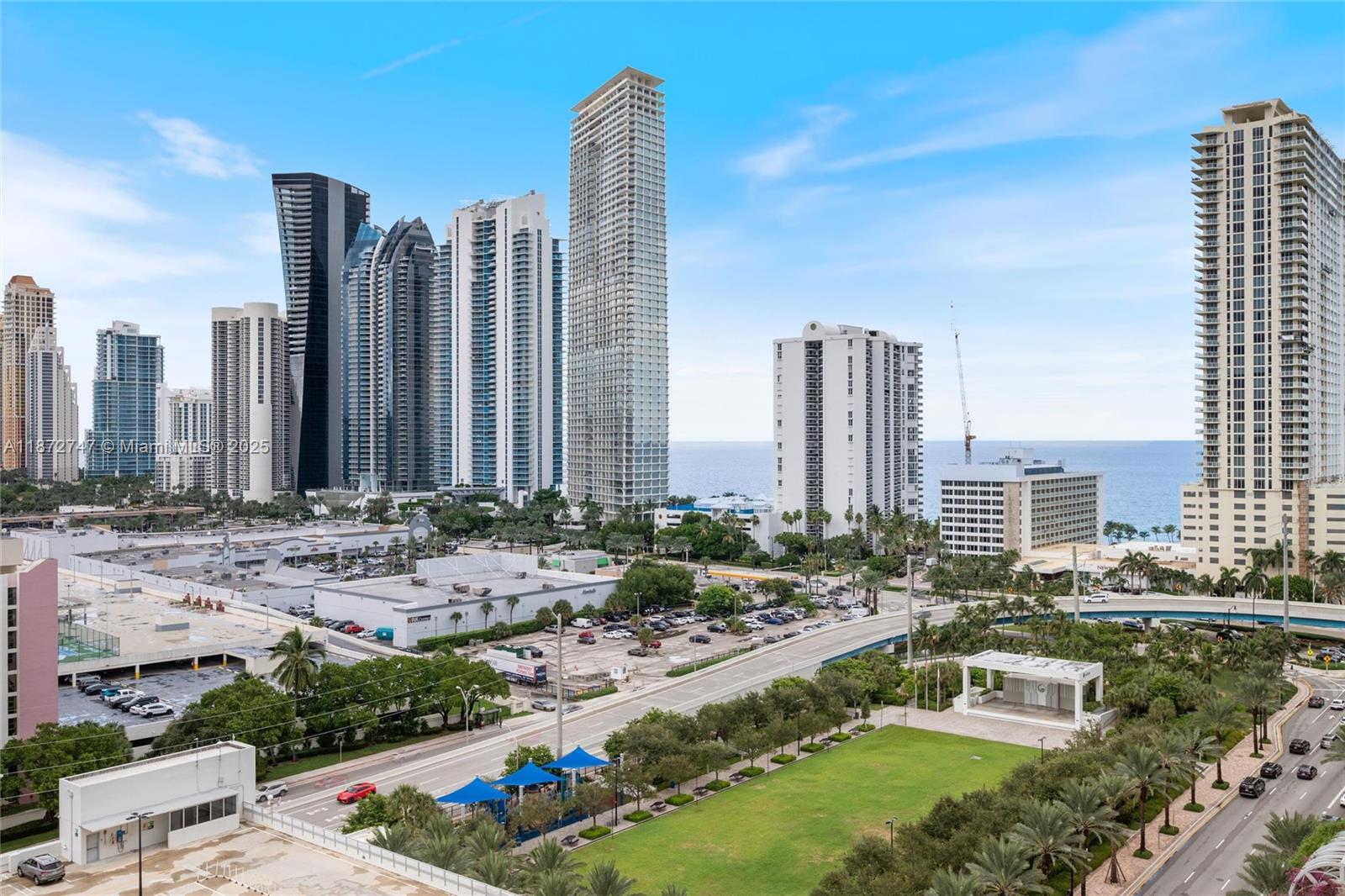 This artfully decorated turn-key unit is awaiting your arrival. Fully furnished by an interior decorator with the finest of "Habitus" furniture. Open floor plan corner unit with a wrap-around balcony and an expansive view of the Sunny Isles skyline and the Atlantic ocean. The property is situated in Florida's riviera Sunny Isles Beach close to airports, fine dining, and world-renowned shopping destinations. The building provides a beach club with concierge beach service with transportation to and from the beach. In this new construction building, you will find luxurious amenities such as a spa, a kid's room, and a splash pad, and a private hotel for your guests only.