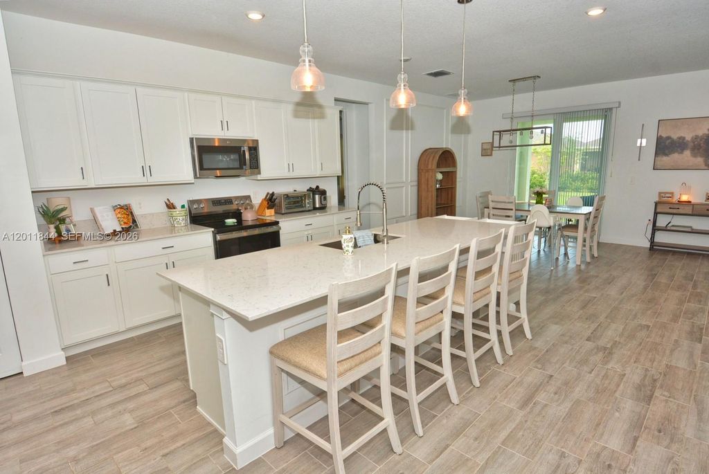 Photo of 12262 SW Roma Cir, Port St Lucie, FL 34987 (MLS # A12011844)