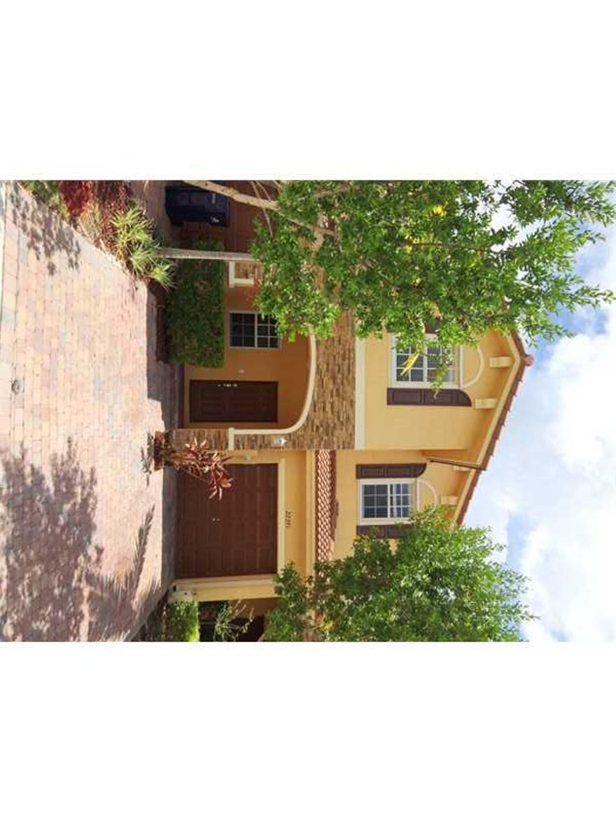 Ellegant unit with wide arch entrance. L-Shape living-dining-family areas. Tankless water heater, indoor washer -dryer. Lovely paved and fenced in backyard. Inside resort style community with gym and huge community pool. Less than 5 minutes from the Turnp ike. Move in ready and easy to show.