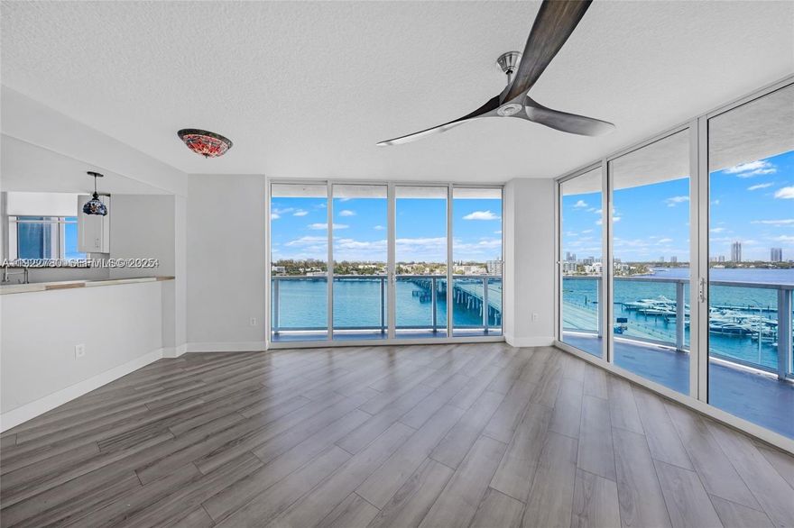 Don’t miss this exceptional opportunity to own a beautifully remodeled 2 Bed, 2.5 Bath corner residence with direct bay views from every room in the heart of vibrant North Bay Village. 
Priced to sell and move-in ready, this home offers 1,262 sq ft of bright, open living space with updated finishes throughout. Newly installed laminate flooring flows seamlessly across the split floor plan, while the renovated kitchen features new cabinetry, a butcher block countertop, and stainless steel appliances.
Enjoy the expansive wraparound balcony overlooking the water, as well as the convenience of an in-unit washer/dryer combo. This full-service building provides outstanding amenities, including a newly remodeled bayfront pool with BBQ area and a fitness center. This is a deal you won’t want to pass up.